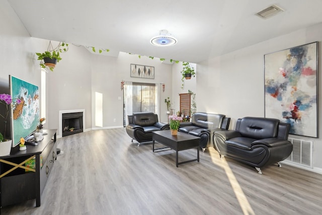 living room featuring light wood-type flooring