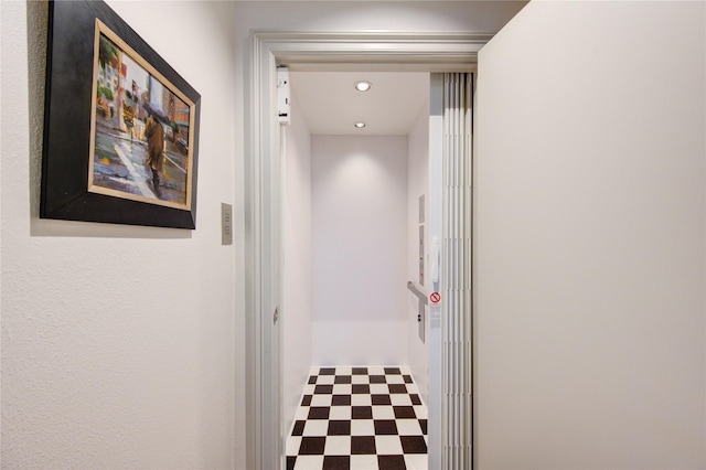 corridor featuring tile patterned floors