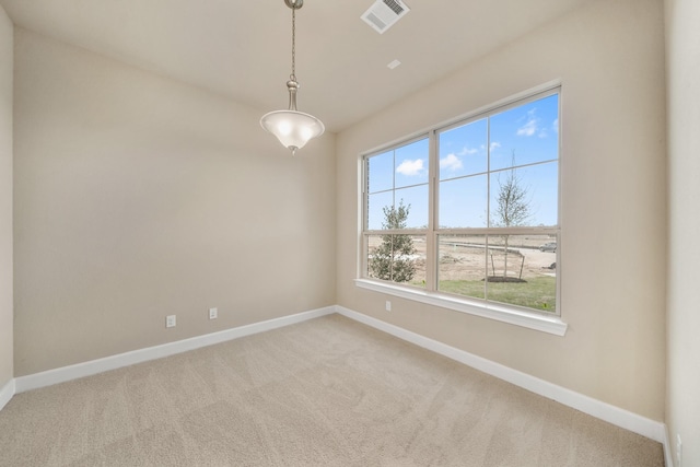 view of carpeted spare room