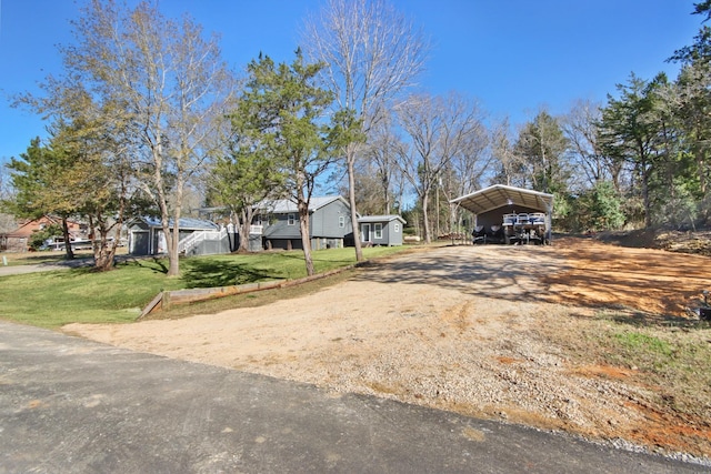 view of yard with a carport