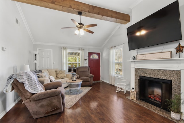 living room featuring vaulted ceiling with beams, crown molding, dark hardwood / wood-style floors, ceiling fan, and a fireplace