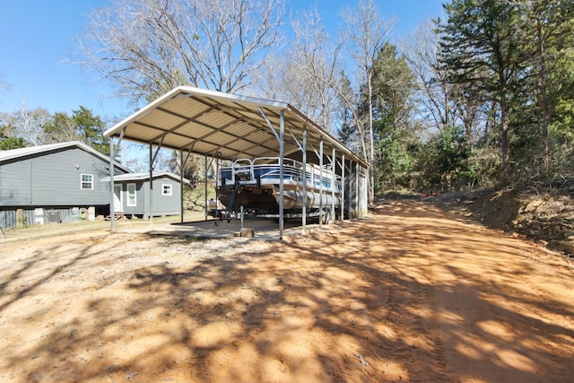 view of parking with a carport