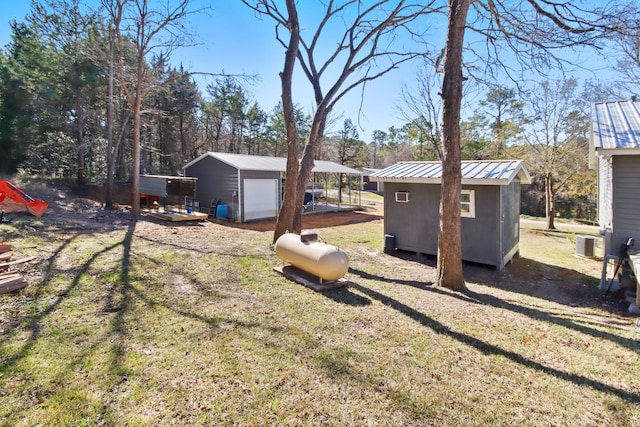 view of yard featuring cooling unit and a storage shed