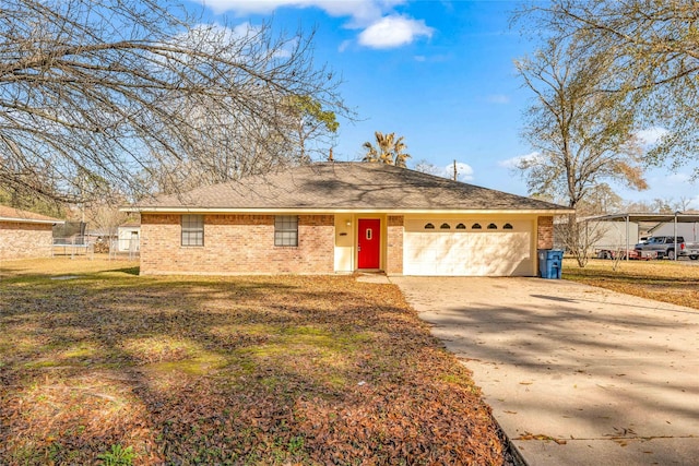 view of front of house with a garage and a front yard