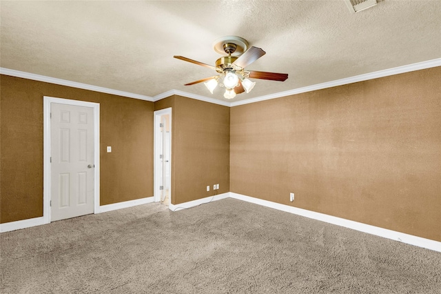 empty room featuring ornamental molding, a textured ceiling, and carpet