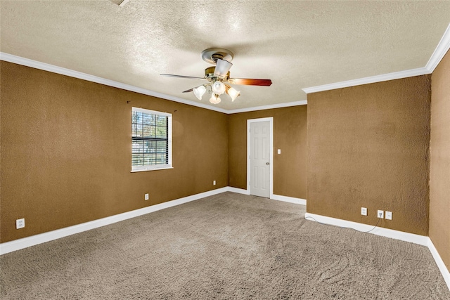 empty room with crown molding, ceiling fan, carpet flooring, and a textured ceiling