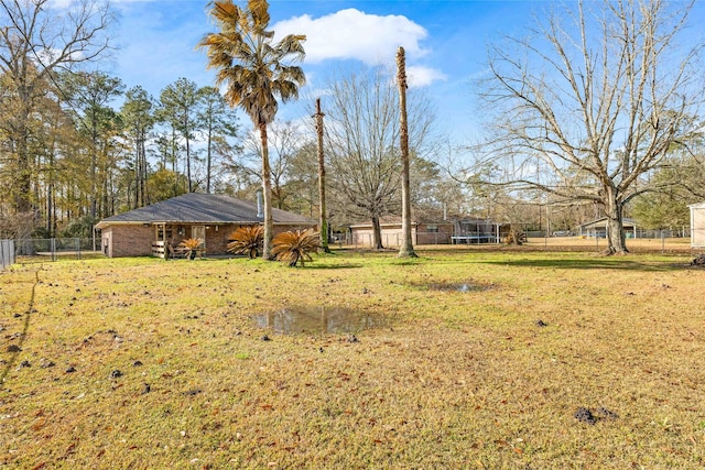 view of yard featuring a trampoline