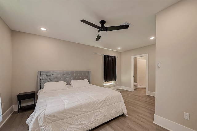 bedroom featuring ceiling fan and wood-type flooring