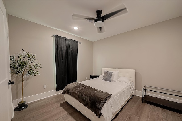 bedroom featuring ceiling fan and wood-type flooring