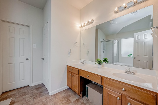 bathroom featuring vanity, lofted ceiling, and plus walk in shower