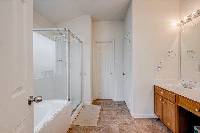 bathroom featuring vanity and separate shower and tub