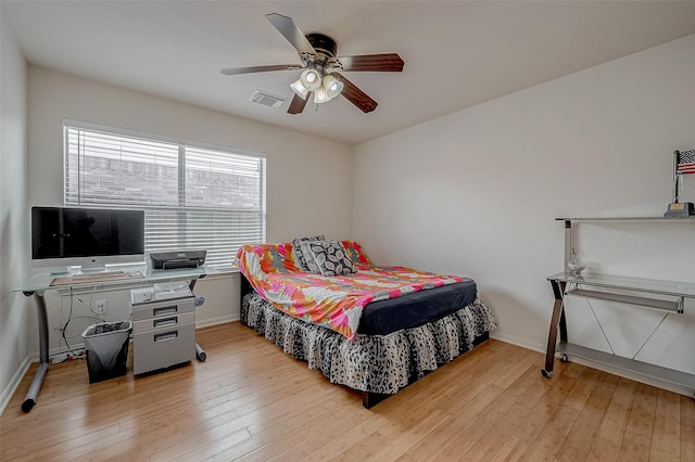 bedroom featuring ceiling fan and light wood-type flooring