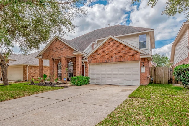 view of front property with a garage and a front lawn