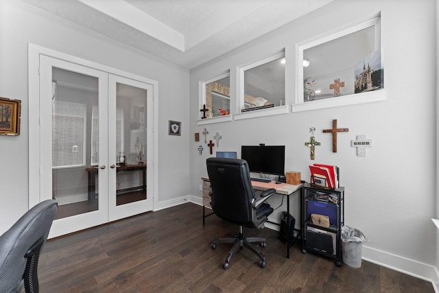 home office with french doors and dark hardwood / wood-style floors