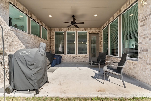 view of patio featuring ceiling fan and area for grilling