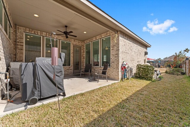 view of patio / terrace featuring ceiling fan