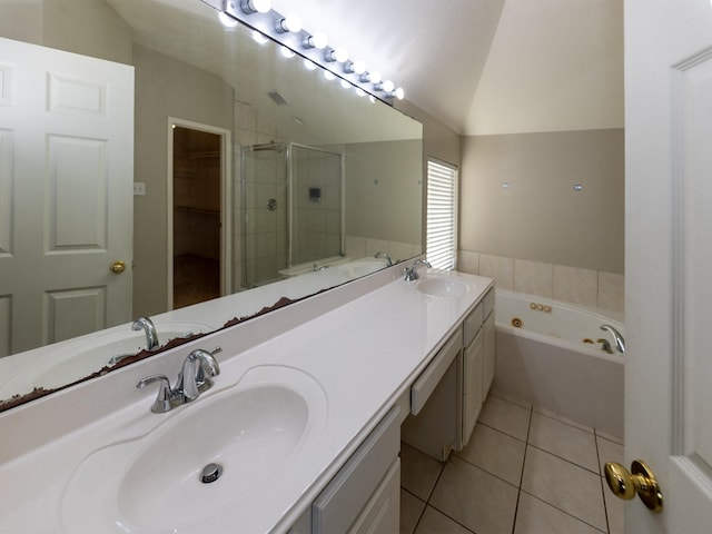 bathroom featuring tile patterned flooring, vanity, vaulted ceiling, and independent shower and bath