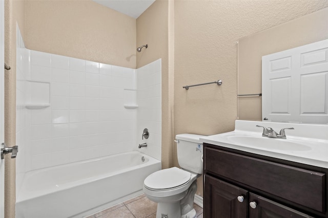 full bathroom featuring vanity, bathing tub / shower combination, tile patterned floors, and toilet