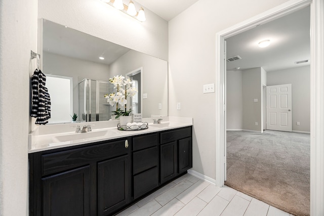 bathroom featuring vanity and walk in shower