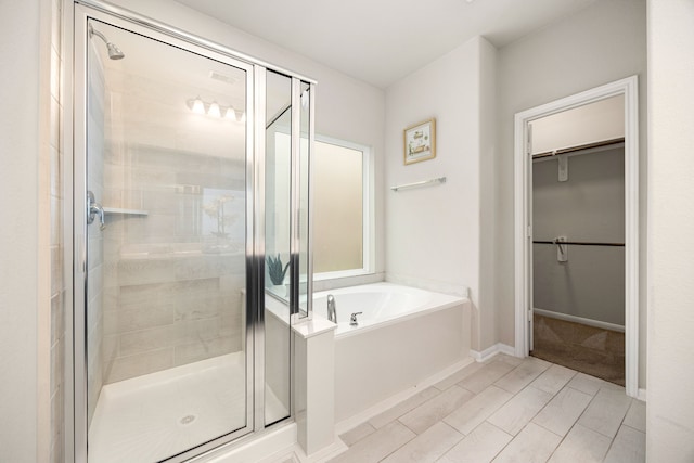 bathroom featuring plus walk in shower