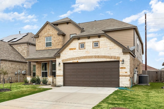 craftsman-style house with a garage, central AC, and a front lawn