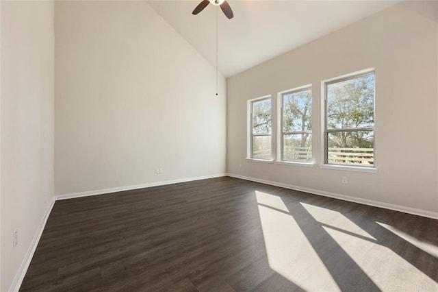 empty room featuring ceiling fan, dark hardwood / wood-style flooring, and high vaulted ceiling