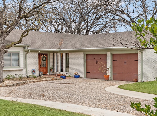 single story home with a garage