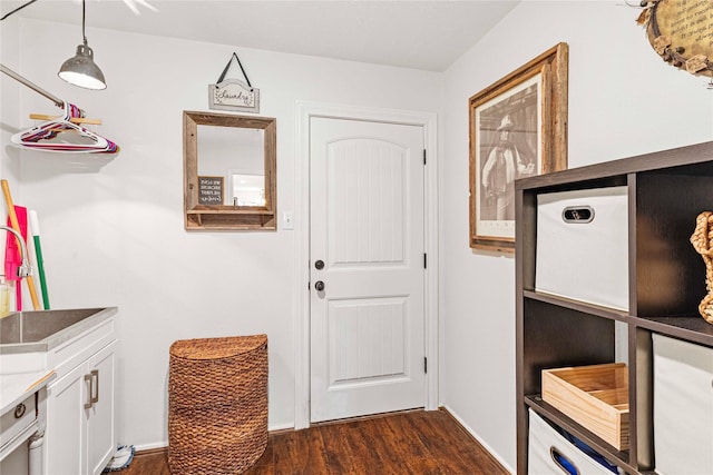 mudroom with dark hardwood / wood-style floors