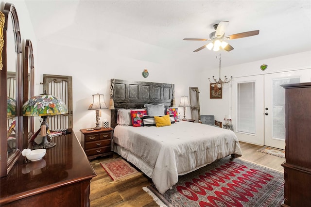 bedroom with hardwood / wood-style floors, french doors, and ceiling fan