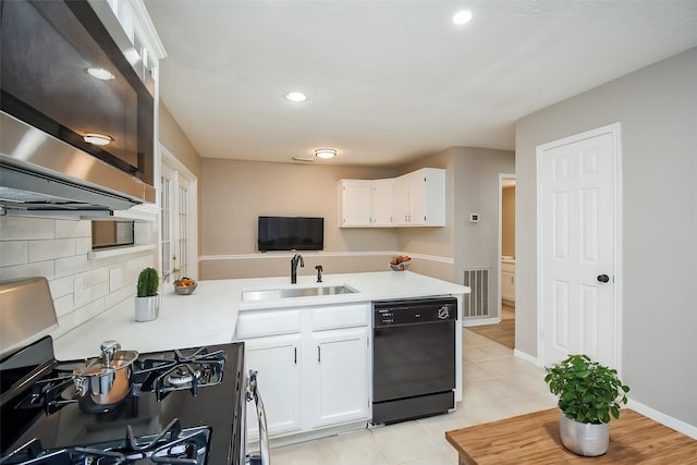 kitchen featuring sink, stainless steel gas range, white cabinets, and dishwasher