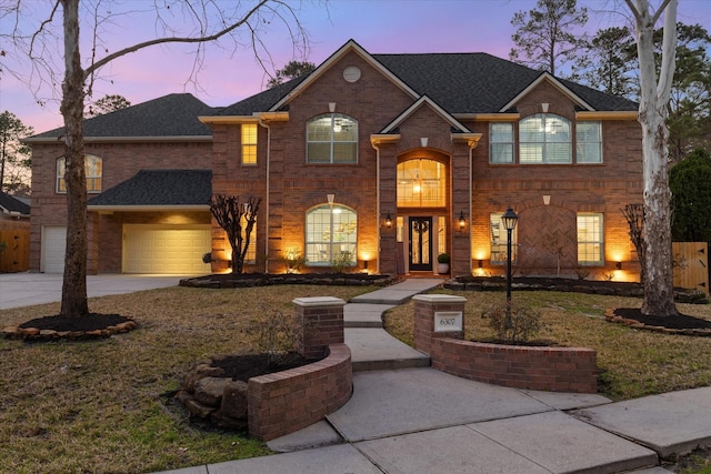 front facade with a garage