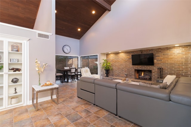 living room featuring a brick fireplace, wood ceiling, built in features, and high vaulted ceiling