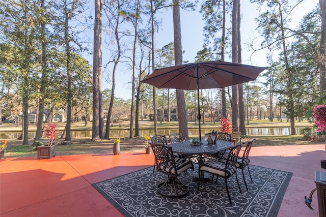 view of patio / terrace with a water view