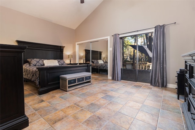 bedroom featuring ceiling fan, access to exterior, high vaulted ceiling, and a closet