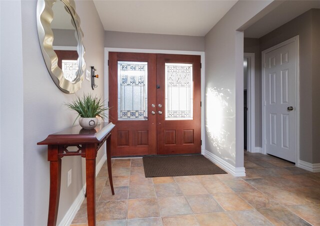 entrance foyer featuring french doors