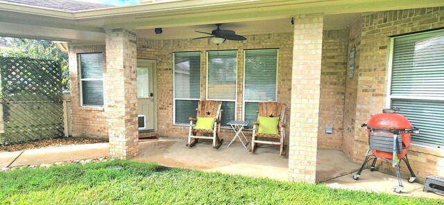 view of patio / terrace featuring ceiling fan