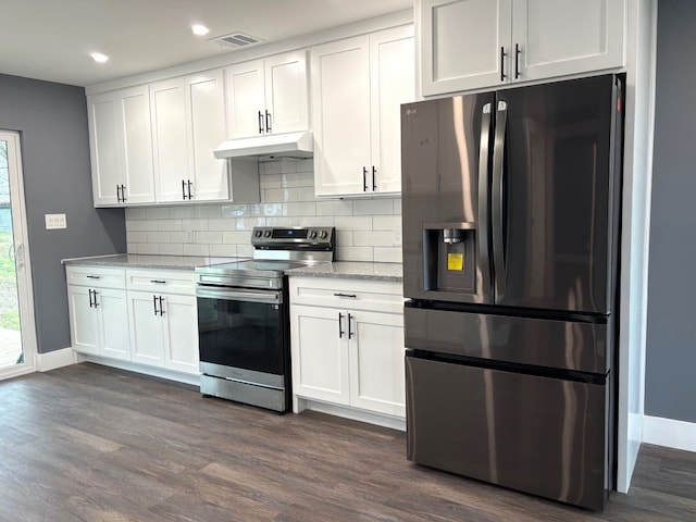 5053 E Fm 485, Cameron, TX 76520 - kitchen with white cabinetry, light stone countertops, stainless steel appliances, and dark hardwood / wood-style floors