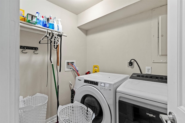 laundry room featuring washing machine and clothes dryer