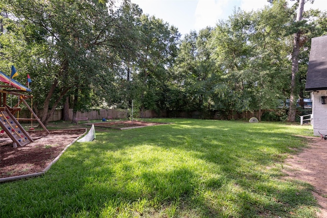 view of yard with a playground