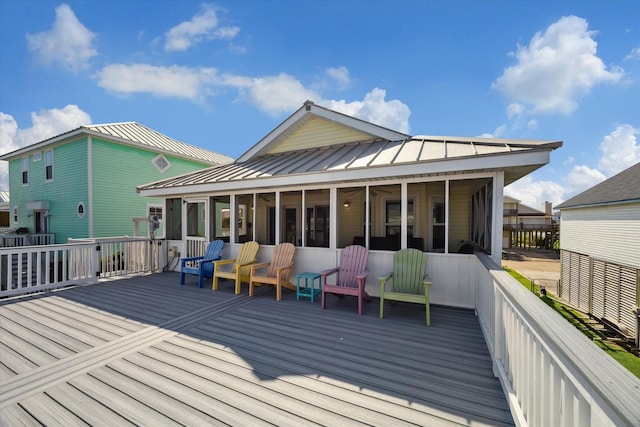 deck featuring a sunroom