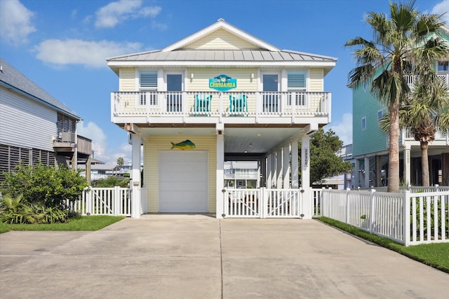 coastal inspired home featuring a garage