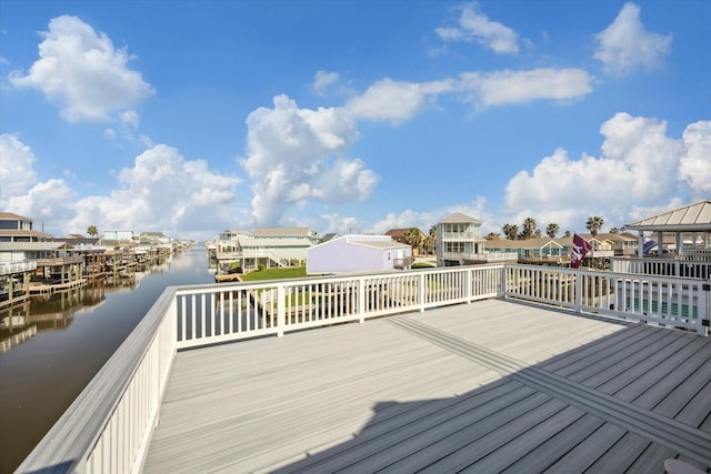 wooden deck with a water view