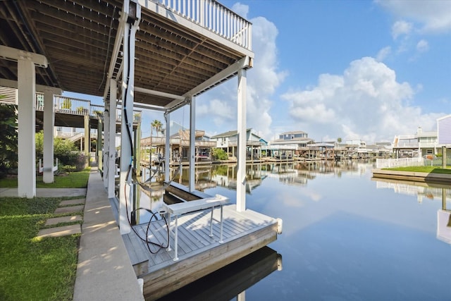 dock area with a water view