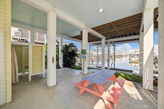 view of patio / terrace with a water view