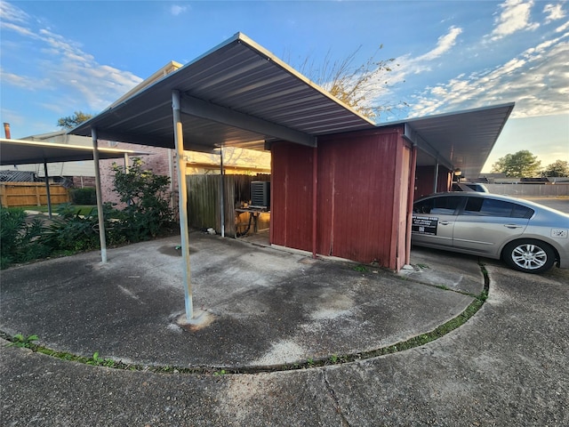 view of parking with a carport