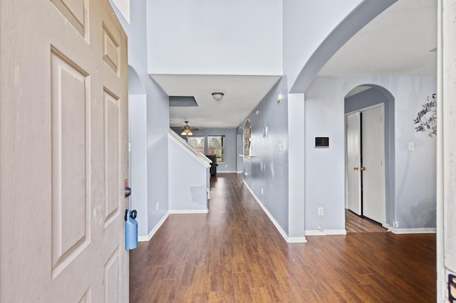 entryway featuring dark hardwood / wood-style floors and ceiling fan