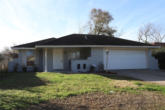 single story home with a garage and a front yard