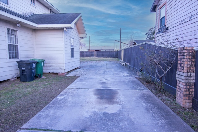 view of property exterior featuring a patio