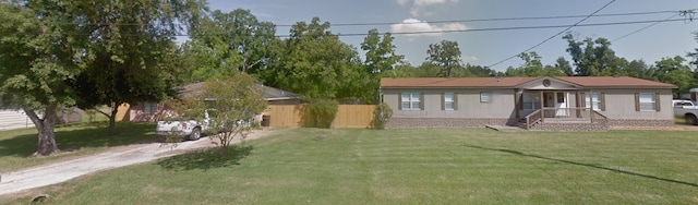 view of front facade with a front lawn