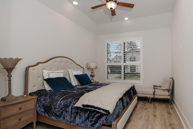 bedroom featuring ceiling fan and light hardwood / wood-style flooring